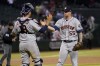 Houston Astros relief pitcher Ryan Pressly (55) greets Houston Astros catcher Jason Castro after a baseball game against the Arizona Diamondbacks, Tuesday, April 12, 2022, in Phoenix. The Astros defeated the Diamondbacks 2-1. (AP Photo/Matt York)
