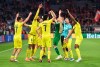 Villareal players celebrate end of the Champions League, second leg, quarterfinal soccer match between Bayern Munich and Villareal at the Allianz Arena, in Munich, Germany, Tuesday, April 12, 2022. (Sven Hoppe/DPA via AP)