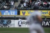 Chicago White Sox left fielder Andrew Vaughn (25) watches a solo home run hit by Seattle Mariners' Cal Raleigh as Raleigh rounds the bases during the seventh inning of a baseball game Thursday, April 14, 2022, in Chicago. (AP Photo/Paul Beaty)