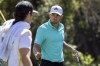 Aaron Wise waves to the crowd after making a par putt on the seventh green during the second round of the RBC Heritage golf tournament, Friday, April 15, 2022, in Hilton Head Island, S.C. (AP Photo/Stephen B. Morton)