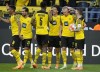 Dortmund's Marco Reus, Erling Haaland, Axel Witsel, Dan-Axel Zagadou, Emre Can and Manuel Akanji, from right, celebrate during the German Bundesliga soccer match between Borussia Dortmund and VfL Wolfsburg in Dortmund, Germany, Saturday, April 16, 2022. (AP Photo/Martin Meissner)