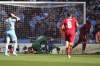 Liverpool's Sadio Mane, right, celebrates after scoring his side's second goal during the English FA Cup semifinal soccer match between Manchester City and Liverpool at Wembley stadium in London, Saturday, April 16, 2022. (AP Photo/Frank Augstein)