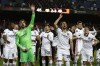 Eintracht Frankfurt players celebrate winning the Europa League, second leg, quarterfinal soccer match against Barcelona at the Camp Nou stadium, in Barcelona, Spain, Thursday, April 14, 2022. (AP Photo/Joan Monfort)