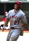 Los Angeles Angels' Mike Trout (27) reacts after being hit by a pitch in the fifth inning against the Texas Rangers of a baseball game on Sunday, April 17, 2022, in Arlington, Texas. (AP Photo/Richard W. Rodriguez)