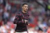 Manchester United's Cristiano Ronaldo warms up before the English Premier League soccer match between Manchester United and Norwich City at Old Trafford stadium in Manchester, England, Saturday, April 16, 2022. (AP Photo/Jon Super)