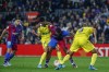 Barcelona's Memphis Depay, second right, next to Cadiz's Ruben Sobrino during a Spanish La Liga soccer match between FC Barcelona and Cadiz at the Camp Nou stadium in Barcelona, Spain, Monday, April 18, 2022. (AP Photo/Joan Monfort)