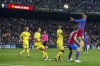 Barcelona's Ferran Torres goes for the header, right, during a Spanish La Liga soccer match between FC Barcelona and Cadiz at the Camp Nou stadium in Barcelona, Spain, Monday, April 18, 2022. (AP Photo/Joan Monfort)