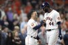Houston Astros' Yordan Alvarez (44) celebrates with Jose Altuve after hitting a two-run home run against the Los Angeles Angels during the seventh inning of a baseball game Monday, April 18, 2022, in Houston. (AP Photo/David J. Phillip)