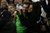 Frankfurt's goalkeeper Kevin Trapp, left, celebrates with Brazilian model Izabel Goulart after winning the Europa League, second leg, quarterfinal soccer match between Barcelona and Eintracht Frankfurt at the Camp Nou stadium, in Barcelona, Spain, Thursday, April 14, 2022. (AP Photo/Joan Monfort)