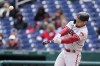 Arizona Diamondbacks' Daulton Varsho hits a solo home run during the third inning in the first game of a baseball doubleheader against the Washington Nationals at Nationals Park, Tuesday, April 19, 2022, in Washington. (AP Photo/Alex Brandon)