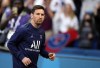 PSG's Lionel Messi runs during the warm up before the League One soccer match between Paris Saint Germain and Marseille, at the Parc des Princes stadium, in Paris, France, Sunday, April 17, 2022. (AP Photo/Francois Mori)