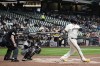 Milwaukee Brewers' Rowdy Tellez hits a two-run home run during the second inning of a baseball game against the Pittsburgh Pirates Tuesday, April 19, 2022, in Milwaukee. (AP Photo/Morry Gash)