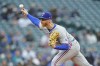 Texas Rangers starting pitcher Jon Gray throws to a Seattle Mariners during the first inning of a baseball game Tuesday, April 19, 2022, in Seattle. (AP Photo/Ted S. Warren)