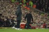 Manchester United's interim manager Ralf Rangnick, right, gestures during the English Premier League soccer match between Liverpool and Manchester United at Anfield stadium in Liverpool, England, Tuesday, April 19, 2022. (AP Photo/Jon Super)