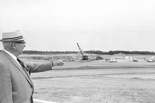 Joe Fowler, 75, a retired Navy admiral, points out the spot being prepared for the Disney World project near Orlando, Fla, May 2, 1969. The idea was presented to Florida lawmakers in a movie house outside Orlando, Florida 55 years ago: Let Disney form its own government and in exchange it would create a futuristic city of tomorrow. (AP Photo/Jim Kerlin)