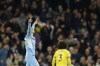 Manchester City's Phil Foden celebrates after scoring his side's second goal during the English Premier League soccer match between Manchester City and Brighton and Hove Albion at the Etihad Stadium in Manchester, England, Wednesday, April 20, 2022. (AP Photo/Dave Thompson)