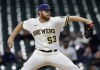 Milwaukee Brewers starting pitcher Brandon Woodruff (53) throws to the Pittsburgh Pirates during the first inning of a baseball game, Wednesday, April 20, 2022, in Milwaukee. (AP Photo/Jeffrey Phelps)