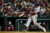 Arizona Diamondbacks' Seth Beer hits a two-run double during the fourth inning against the Washington Nationals in a baseball game at Nationals Park, Wednesday, April 20, 2022, in Washington. (AP Photo/Alex Brandon)