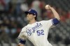 Kansas City Royals starting pitcher Daniel Lynch throws during the first inning of a baseball game against the Minnesota Twins Wednesday, April 20, 2022, in Kansas City, Mo. (AP Photo/Charlie Riedel)