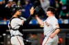 San Francisco Giants catcher Joey Bart, left, celebrates with relief pitcher Jake McGee after the team's 5-2 win in a baseball game against the New York Mets on Wednesday, April 20, 2022, in New York. (AP Photo/Frank Franklin II)