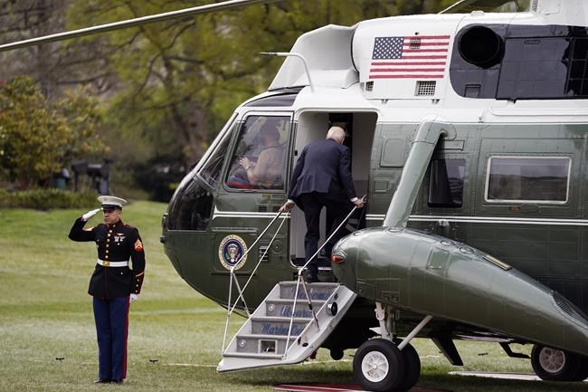President Joe Biden boards Marine One on the South Lawn at the White House, Thursday, April 21, 2022, in Washington. The President is traveling to Andrews Air Force Base and then on to the West coast. (AP Photo/Evan Vucci)