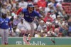 Toronto Blue Jays' Bo Bichette runs toward first after hitting an RBI single allowing Blue Jays' Gosuke Katoh to score in the third inning of a baseball game against Boston Red Sox, Thursday, April 21, 2022, in Boston. (AP Photo/Steven Senne)