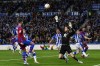 Barcelona's Ferran Torres, left, tries a shot during a Spanish La Liga soccer match between Real Sociedad and FC Barcelona at the Reale Arena stadium in San Sebastian, Spain, Thursday, April 21, 2022. (AP Photo/Alvaro Barrientos)