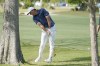 Scottie Scheffler hits from among the trees that line the 12th fairway, during the first round of the PGA Zurich Classic golf tournament at TPC Louisiana in Avondale, La., Thursday, April 21, 2022. (AP Photo/Gerald Herbert)