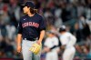 Cleveland Guardians starting pitcher Eli Morgan, left, watches a ball hit by New York Yankees' Aaron Judge, back right, who runs the bases after hitting a two-run home run during the third inning of a baseball game Friday, April 22, 2022, in New York. (AP Photo/Frank Franklin II)