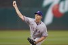 Texas Rangers' Glenn Otto pitches against the Oakland Athletics during the first inning of a baseball game in Oakland, Calif., Friday, April 22, 2022. (AP Photo/Jeff Chiu)
