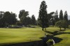 Jin Young Ko walks across a bridge on the 17th hole during the third round of LPGA's DIO Implant LA Open golf tournament at Wilshire Country Club on Saturday, April 23, 2022, in Los Angeles. (AP Photo/Ashley Landis)