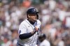 Detroit Tigers designated hitter Miguel Cabrera runs to first after connecting for a single during the sixth inning of the first baseball game of a doubleheader against the Colorado Rockies, Saturday, April 23, 2022, in Detroit. (AP Photo/Carlos Osorio)
