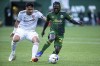 Portland Timbers midfielder Yimmi Chara (23) tries to maintain possession against Real Salt Lake's Marcelo Silva during an MLS soccer match Saturday, April 23, 2022, in Portland, Ore. (Sean Meagher/The Oregonian via AP)
