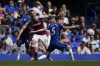 West Ham's Tomas Soucek, center vies for the ball with Chelsea's Jorginho, right and Chelsea's N'Golo Kante during the English Premier League soccer match between Chelsea and West Ham United at Stamford Bridge in London, Sunday, April 24, 2022. (AP Photo/Alastair Grant)