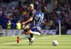 Brighton and Hove Albion's Moises Caicedo, right, goes down after a challenge from Southampton's Oriol Romeu during the English Premier League soccer match at the AMEX Stadium, Brighton, England, Sunday, April 24, 2022. (Gareth Fuller/PA via AP)