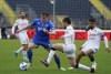 Empoli's Szymon Zurkowski, left, challenges Napoli's Mario Rui during the Serie A soccer match between Empoli and Napoli at Castellani Stadium, Empoli, Italy, Sunday, April 24, 2022. (Marco Bucco/LaPresse via AP)