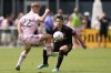 Inter Miami midfielder Bryce Duke (22) controls a pass against Atlanta United midfielder Emerson Hyndman, Sunday, April 24, 2022, during the second half of an MLS soccer match in Fort Lauderdale, Fla. (AP Photo/Wilfredo Lee)