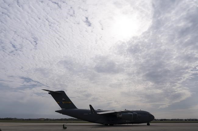 A plane carrying Secretary of Defense Lloyd Austin taxis for takeoff, Saturday, April 23, 2022, at Andrews Air Force Base, Md. The Biden administration has unveiled new U.S. military assistance and a diplomatic surge for Ukraine as Secretary of State Antony Blinken and Austin made a secrecy-shrouded visit to the capital of Kyiv. (AP Photo/Alex Brandon, Pool)
