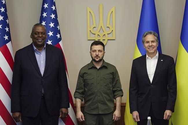In this photo provided by the Ukrainian Presidential Press Office on Monday, April 25, 2022, from left; U.S. Secretary of Defense Lloyd Austin, Ukrainian President Volodymyr Zelenskyy and U.S. Secretary of State Antony Blinken pose for a picture during their meeting Sunday, April 24, 2022, in Kyiv, Ukraine. (Ukrainian Presidential Press Office via AP)