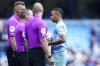 Referee Kevin Friend hands the match ball to Manchester City's Gabriel Jesus at the end of the English Premier League soccer match between Manchester City and Watford at Etihad stadium in Manchester, England, Saturday, April 23, 2022. Jesus scored four goals in Manchester City's 5-1 win. (AP Photo/Jon Super)