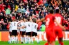 Benfica's players, in white, celebrate the second goal, during the UEFA Youth League final soccer match between S.L. Benfica Juniors from Portugal and FC Salzburg U-19 from Austria, at the stadium Colovray Sports Centre, in Nyon, Switzerland, Monday, April 25, 2022. (Laurent Gillieron/Keystone via AP)