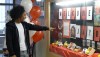 Toronto FC midfielder Jayden Nelson looks at a display honouring his years at Copeland Public School in Brampton, Ont., Monday, April 25, 2022. Nelson, who attended Grades 1 through 5 at the school, is funding a snacks program for Copeland students. THE CANADIAN PRESS/Neil Davidson