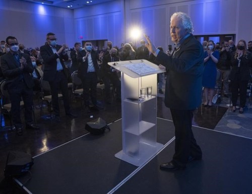 Jean Charest speaks to supporters at a campaign launch event in Laval, Que., Thursday, March 24, 2022. Charest is promising to repeal the federal Liberal's consumer carbon price and eliminate HST on low-carbon purchases. THE CANADIAN PRESS/Ryan Remiorz