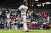 San Francisco Giants' Luis Gonzalez hits a two-run home run during the ninth inning of a baseball game against the Milwaukee Brewers Monday, April 25, 2022, in Milwaukee. (AP Photo/Morry Gash)