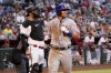 New York Mets' Jeff McNeil scores on a base hit by Tomas Nido during the fifth inning of a baseball game as Arizona Diamondbacks catcher Carson Kelly watches the play, Saturday, April 23, 2022, in Phoenix. (AP Photo/Matt York)