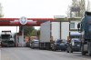 People wait in vehicles to cross the border seen from the Moldovan side of the Varnita-Bender crossing between Moldova and the Moldovan separatist region of Trans-Dniester, Tuesday, April 26, 2022. Police in the Moldovan separatist region of Trans-Dniester say two explosions on Tuesday morning at a radio facility close to the Ukrainian border knocked two powerful antennas out of service just a day after several explosions believed to be caused by rocket-propelled grenades were reported to have hit the Ministry of State Security in the city of Tiraspol, the region's capital. (AP Photo/Aurel Obreja)