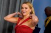 FILE - Reese Witherspoon enters the press room at the Oscars on Sunday, April 25, 2021, at Union Station in Los Angeles. Actor Reese Witherspoon and Tennessee Titans running back Derrick Henry have joined the ownership group of Major League Soccer's Nashville team ahead of the opening Sunday of Geodis Park, its 30,000-seat stadium. Witherspoon's husband, agent and investor Jim Toth, also has joined the ownership group, the team said Tuesday, April 26, 2022. (AP Photo/Chris Pizzello, Pool, File)