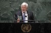 Bob Rae, ambassador of Canada to the United Nations, speaks while holding a copy of the United Nations charter at the general assembly hall, Wednesday, Feb. 23, 2022, at United Nations Headquarters. Rae denounced as undemocratic the Security Council's veto power as the General Assembly voted Tuesday to subject the world's most powerful body to more public scrutiny. (AP Photo/John Minchillo)