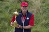FILE - Team USA captain Steve Stricker poses with the trophy after the Ryder Cup matches at the Whistling Straits Golf Course, Sunday, Sept. 26, 2021, in Sheboygan, Wis. Stricker returns to competition this week on the PGA Tour Champions after a mysterious virus hospitalized him late last year. (AP Photo/Ashley Landis, File)