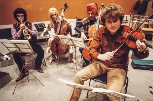 Canadian singer-songwriter Susan Jacks (second left), shown with her bandmates from the Poppy Family, died Monday at the age of 73. The photo was taken in 1969 in London, where they were recording their first album with the London Philharmonic, and mock-playing the orchestra's instruments. THE CANADIAN PRESS/HO-Eric Hayes **MANDATORY CREDIT**